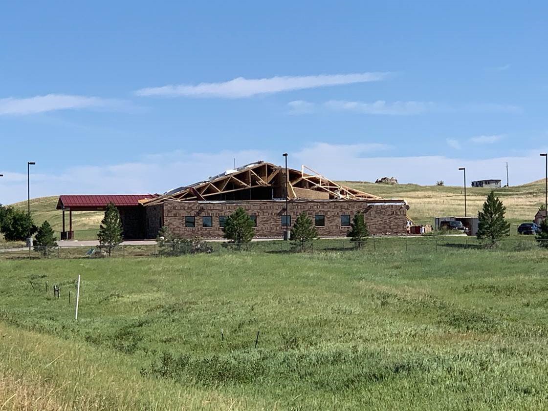 A picture containing grass, sky, outdoor, field